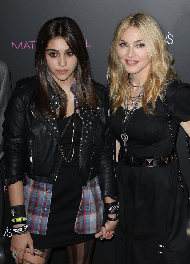 Madonna, black dress, bracelets, necklace, Lourdes Leon, ripped tights, flannel shirt, black studded leather jacket, 